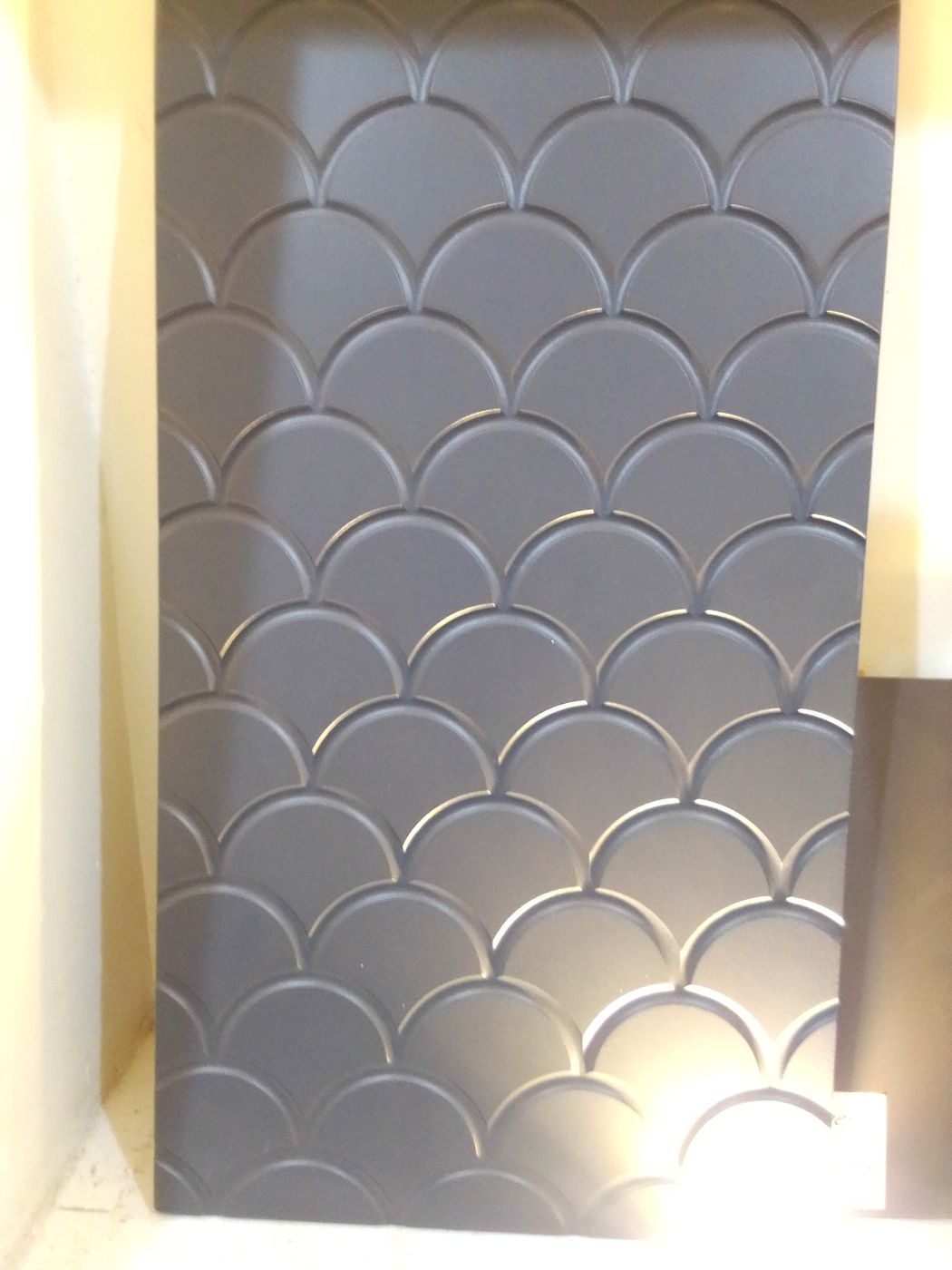 CNC-carved 3D panel with a fish-scale pattern, cut by Procut