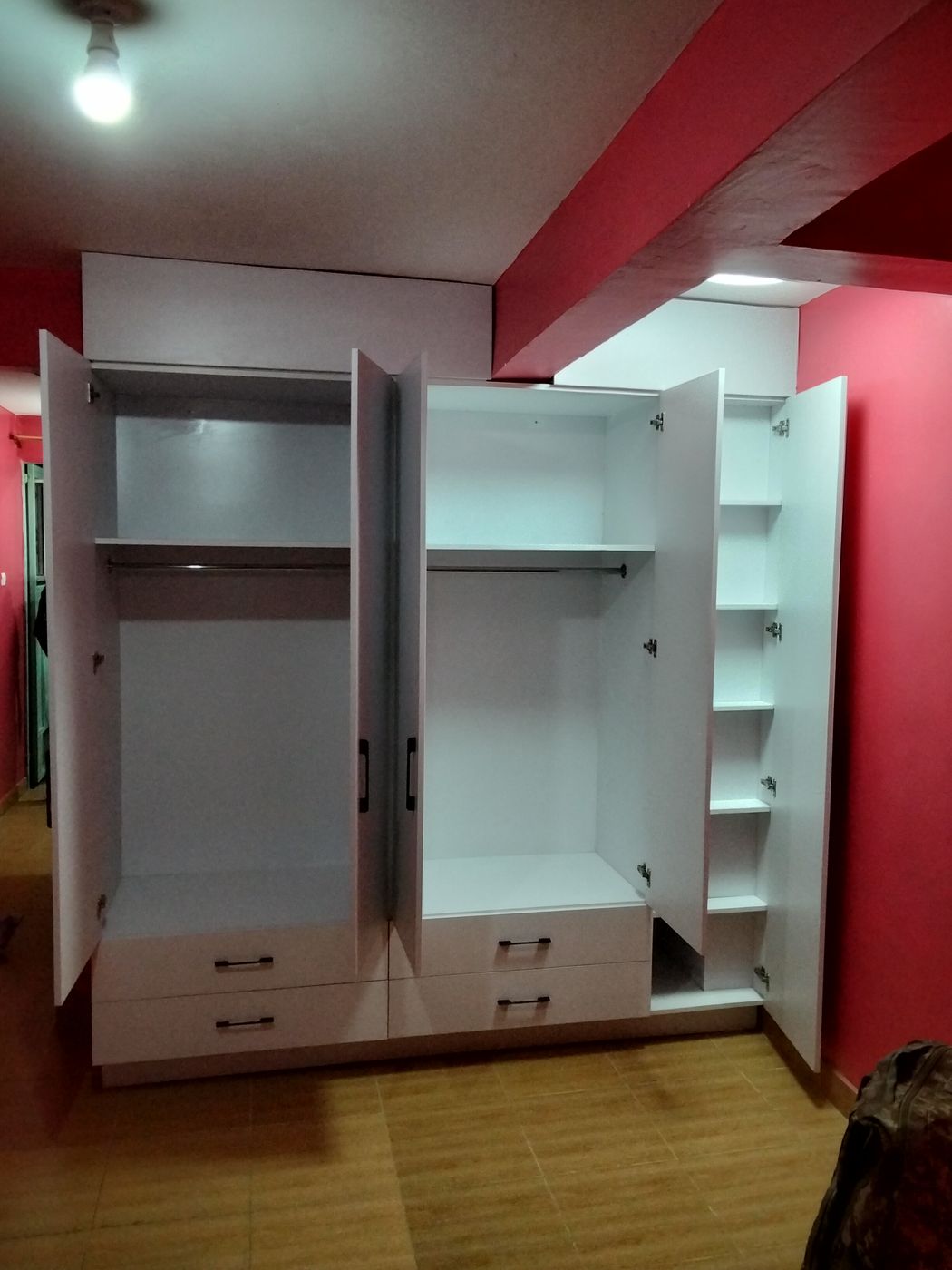 Inside a built-in wardrobe: shelves, hanging space and drawers